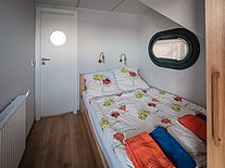 Schlafzimmer mit Doppelbett